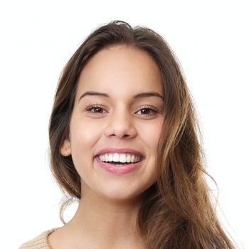 young lady smiling with arms crossed e1627034700490.jpg
